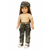 An 18-inch doll with long brown hair wearing a beige T-shirt, green and brown camouflage cargo pants, a matching camouflage cap, and white sneakers, standing against a plain white background.