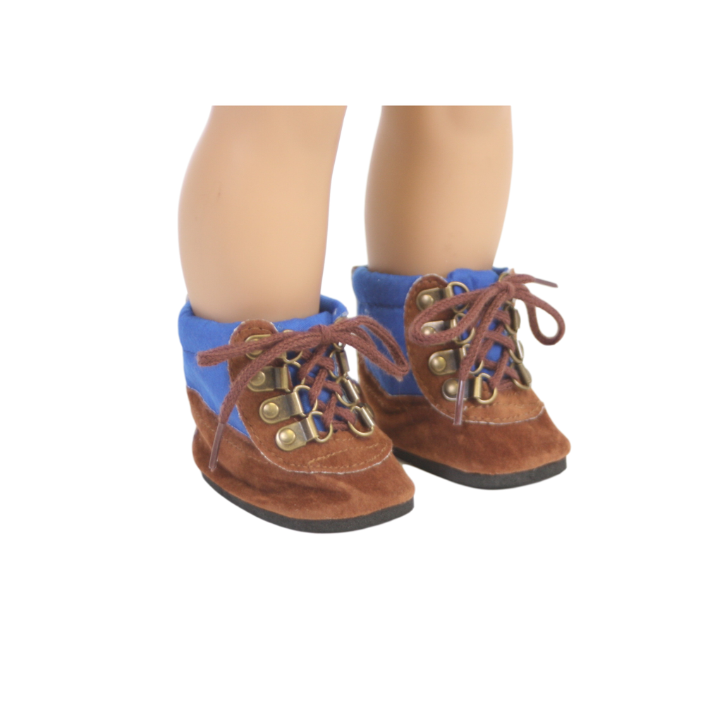 A pair of brown suede doll hiking boots with blue trim and lace-up front, designed for 18-inch dolls.